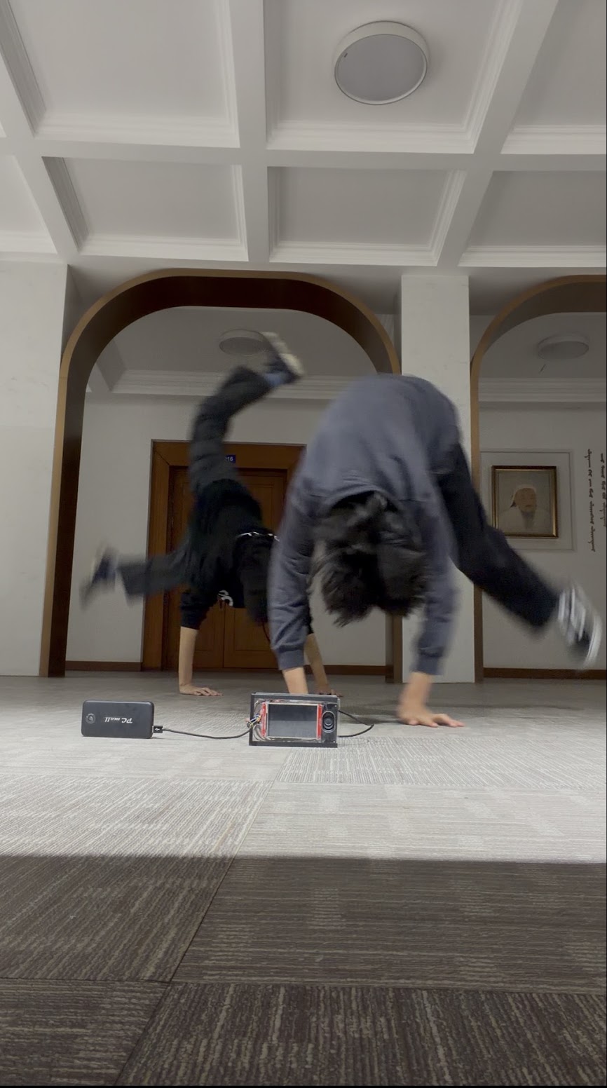 Doing a handstand in a hall before the competition